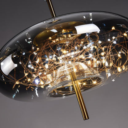 Residence Supply Twirl Pendant Light hanging fixture with a modern, spiral design and sleek metal finish.