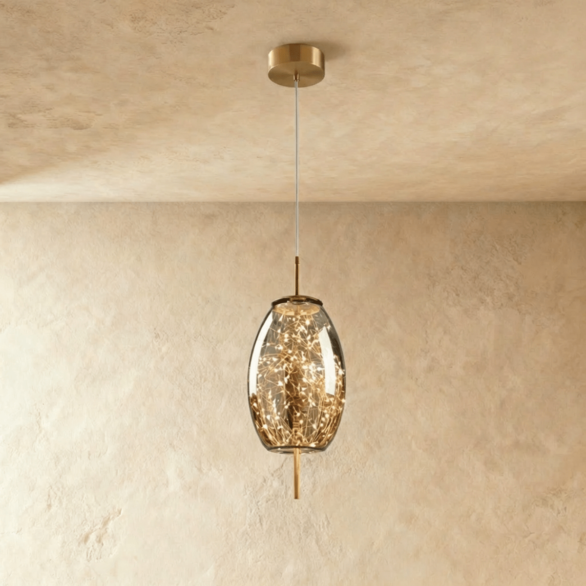Residence Supply Twirl Pendant Light hanging fixture with a modern, swirling design and metal finish.