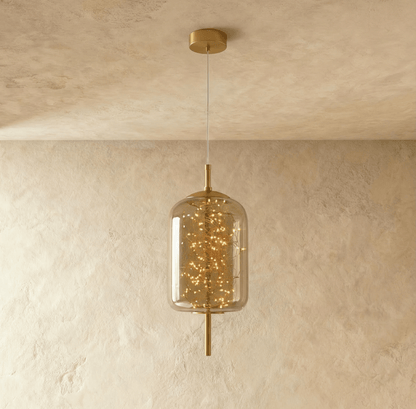 Modern Twirl Pendant Light by Residence Supply with sleek, swirling design hanging from a ceiling mount.