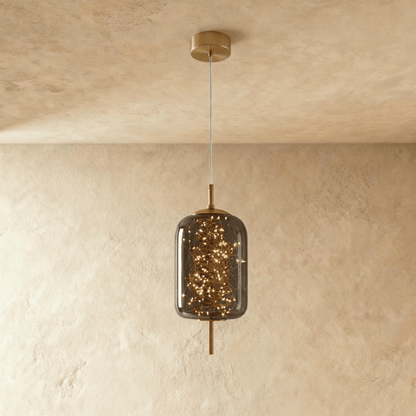 Residence Supply Twirl Pendant Light with swirling metal design hanging from ceiling fixture.