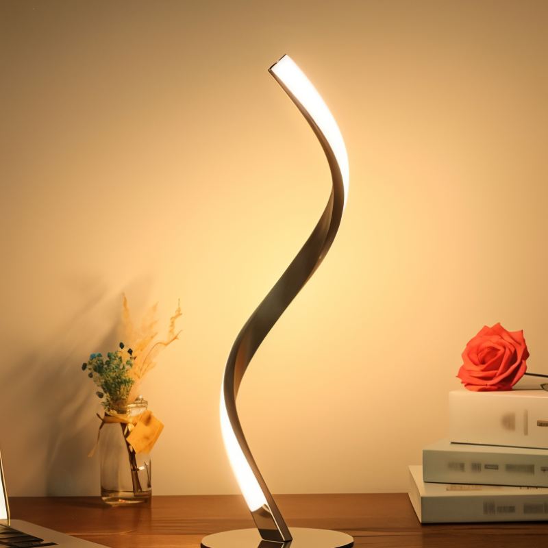 Residence Supply Twist Table Lamp with a modern design, featuring a curved metal base and fabric lampshade.