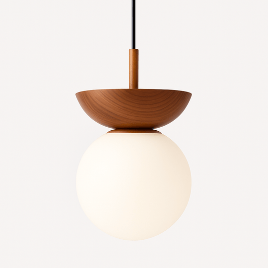 Modern Tzuria pendant light by Residence Supply featuring a sleek design with a metal fixture and glass shade.