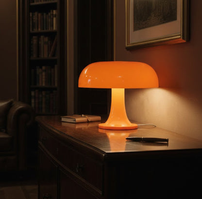 Nuvé Luma Arancio skincare product in a sleek orange container, showcasing its modern design and vibrant color.