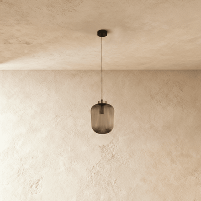 Modern Vahni Pendant Light by Residence Supply with a sleek, minimalist design featuring a black finish and a round shape.