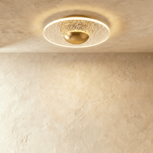 Valtri ceiling light by Residence Supply featuring a modern, circular design with a sleek metal finish and integrated LED lighting.