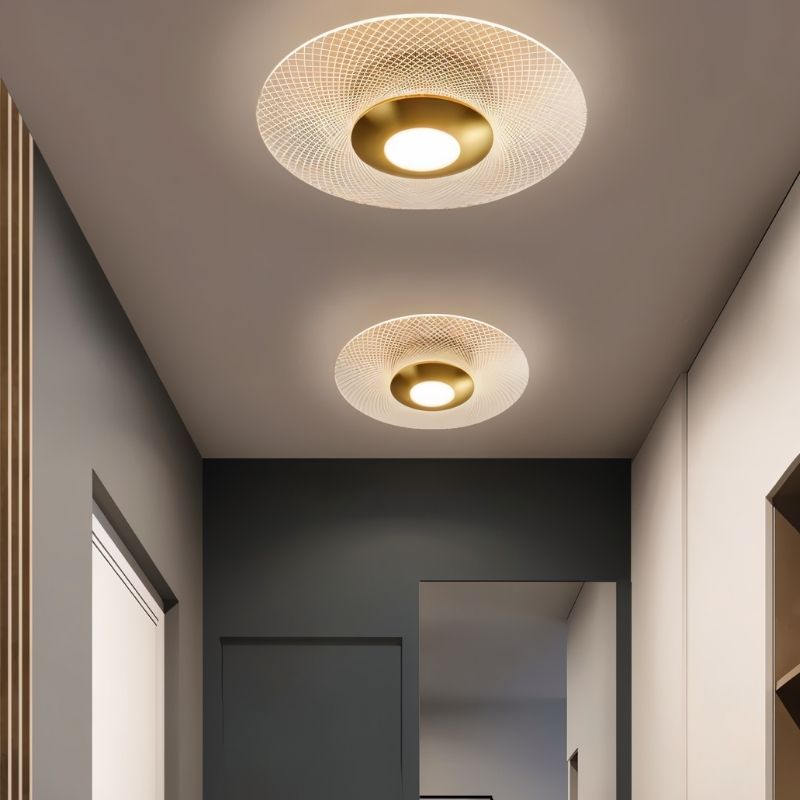 Valtri patterned ceiling light by Residence Supply illuminating a hallway with stylish, modern design and decorative geometric patterns.