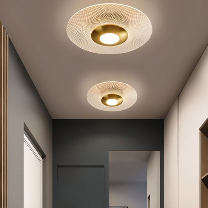 Valtri patterned ceiling light by Residence Supply illuminating a hallway with stylish, modern design and decorative geometric patterns.