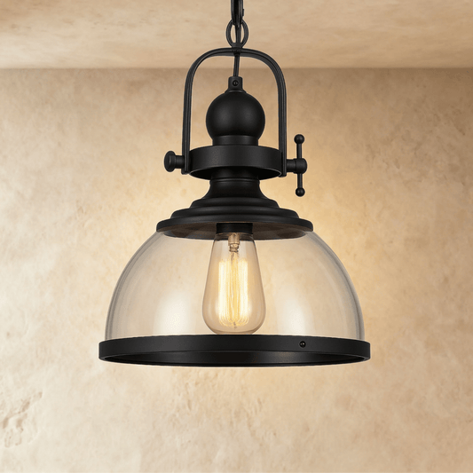 Vatik pendant light by Residence Supply hanging from ceiling, featuring a modern design with a sleek, minimalist metal shade.