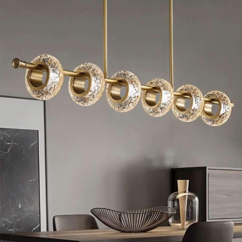 Residence Supply Volrin chandelier with linear glass design, perfect for dining room lighting.