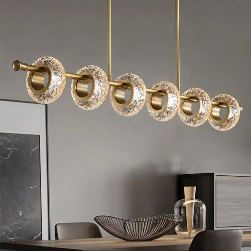 Residence Supply Volrin chandelier with linear glass design, perfect for dining room lighting.