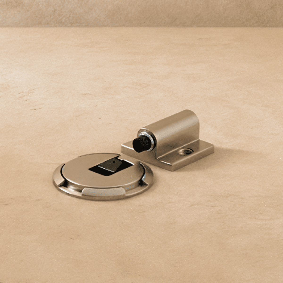 Residence Supply Walik door stop mounted on a wall, made of metal, used to prevent door damage and keep doors open.