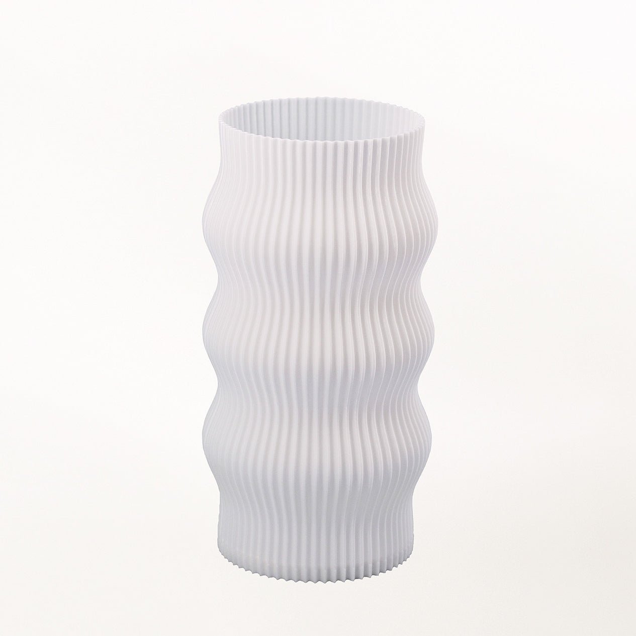 Terra Labs Wub table lamp with a modern, rounded design and soft glowing light, perfect for bedside or living room decor.