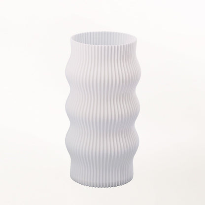 Terra Labs Wub table lamp with a modern, rounded design and soft glowing light, perfect for bedside or living room decor.
