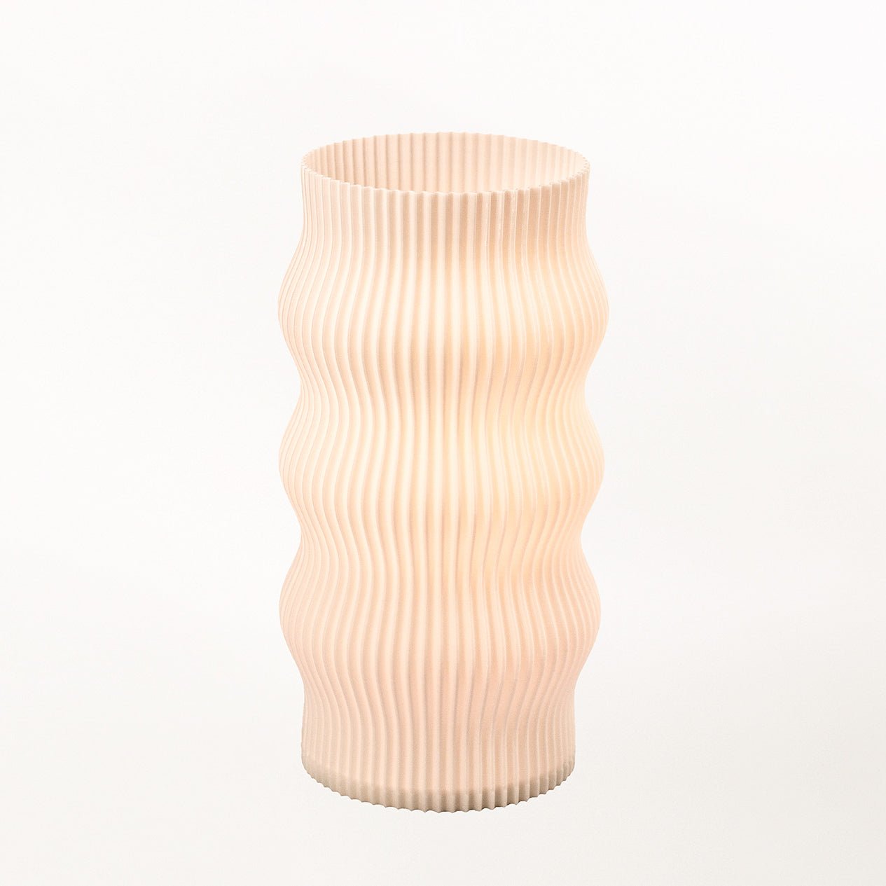 Terra Labs Wub table lamp with a modern, sculptural design and soft lighting, perfect for living room or bedside decor.