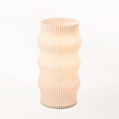 Terra Labs Wub table lamp with a modern, sculptural design and soft lighting, perfect for living room or bedside decor.
