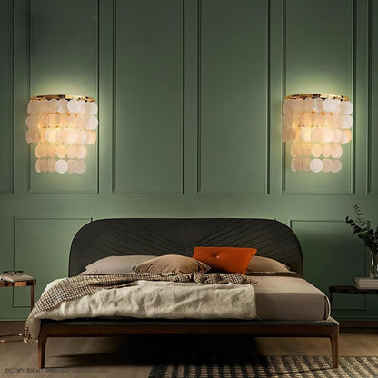 Modern Xandor Wall Lamp by Residence Supply featuring sleek design and warm lighting for contemporary home decor.