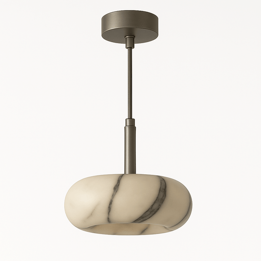 Modern Xovira Pendant Light by Residence Supply, featuring a sleek design with metal and glass elements hanging from a ceiling mount.