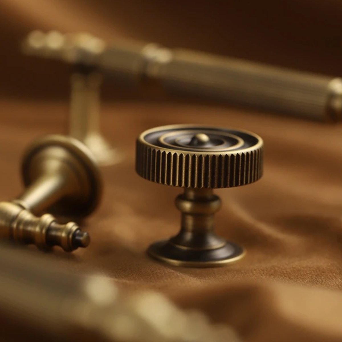 Yasha Knob and Pull Bar by Residence Supply, modern cabinet hardware in brushed metal finish for kitchen or bathroom cabinets.