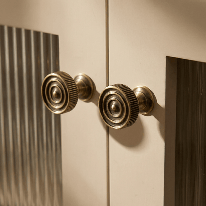 Yasha knob and pull bar by Residence Supply, modern cabinet hardware in matte black finish for kitchen or furniture cabinets.