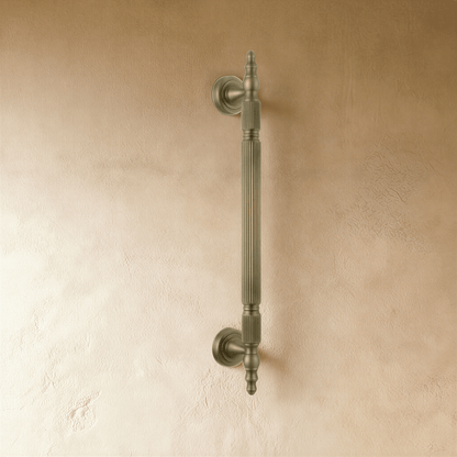 Yasha knob and pull bar from Residence Supply, brass cabinet hardware with a sleek modern design for kitchen or furniture.