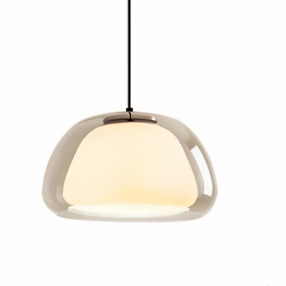 Pendant light with a modern Zabda design by Residence Supply, featuring a sleek, minimalist style and warm ambient lighting.