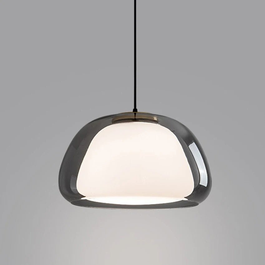 Zabda Pendant Light by Residence Supply hanging with a sleek, modern design and warm illumination for contemporary interior decor