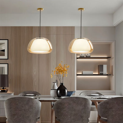 Modern Zabda Pendant Light by Residence Supply featuring a sleek, minimalist design with a metal finish and hanging cord.