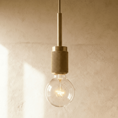 Zafiris Pendant Light by Residence Supply hanging with a sleek, modern design and a metallic finish, ideal for contemporary interiors.
