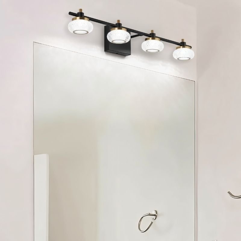 Zelvin wall lamp by Residence Supply featuring a modern design with a sleek metal finish and ambient lighting.