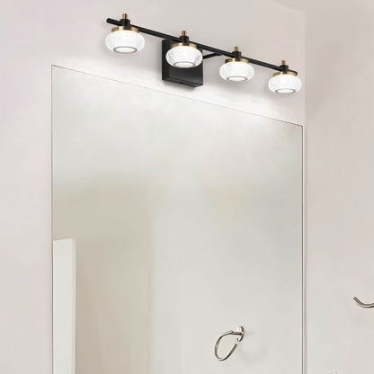 Zelvin wall lamp by Residence Supply featuring a modern design with a sleek metal finish and ambient lighting.