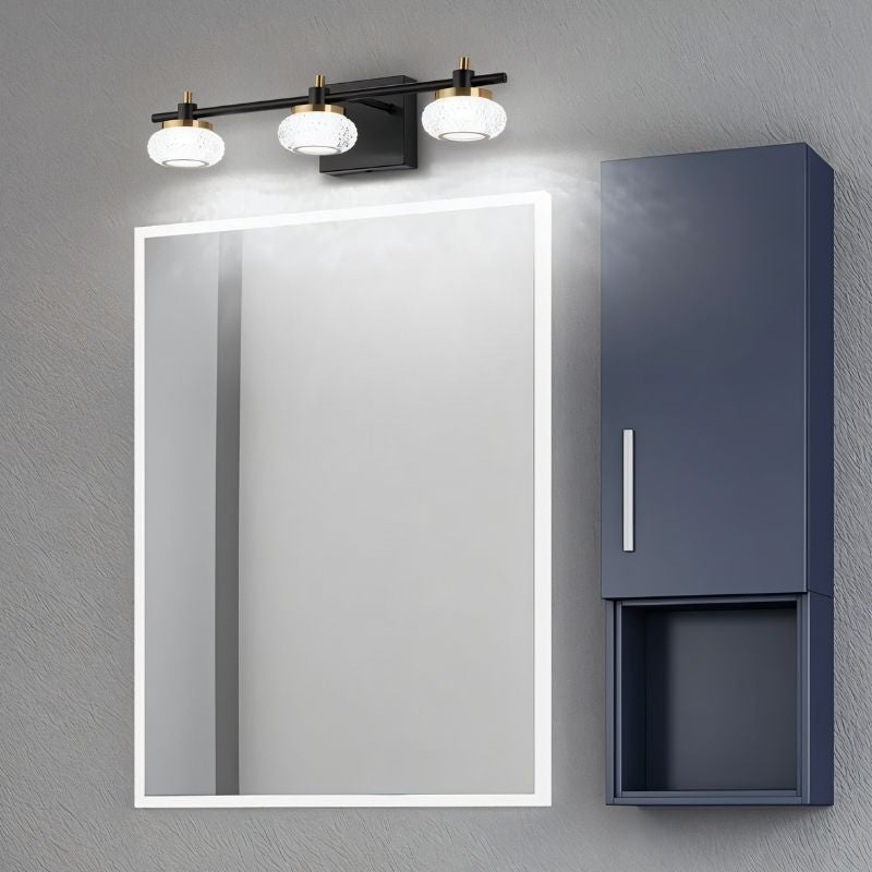 Residence Supply Zelvin Wall Lamp mounted on a wall with a sleek, modern design and a warm light fixture.