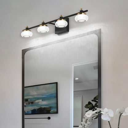 Residence Supply Zelvin Wall Lamp mounted on a wall with modern design, featuring a sleek metal finish and ambient lighting.