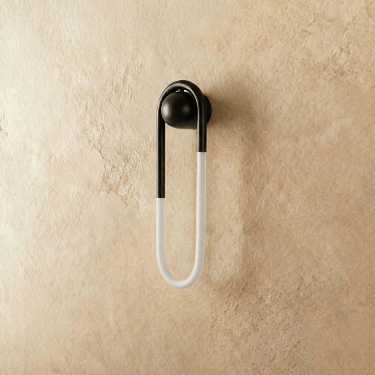 Modern Zenn Wall Lamp by Residence Supply with sleek metal finish and minimalist design mounted on a wall.