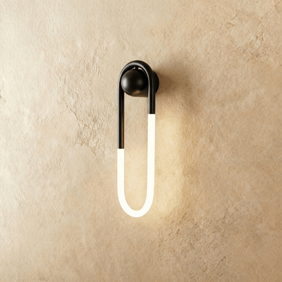 Modern Zenn Wall Lamp by Residence Supply featuring a sleek design with a white shade and wall mount for ambient lighting.
