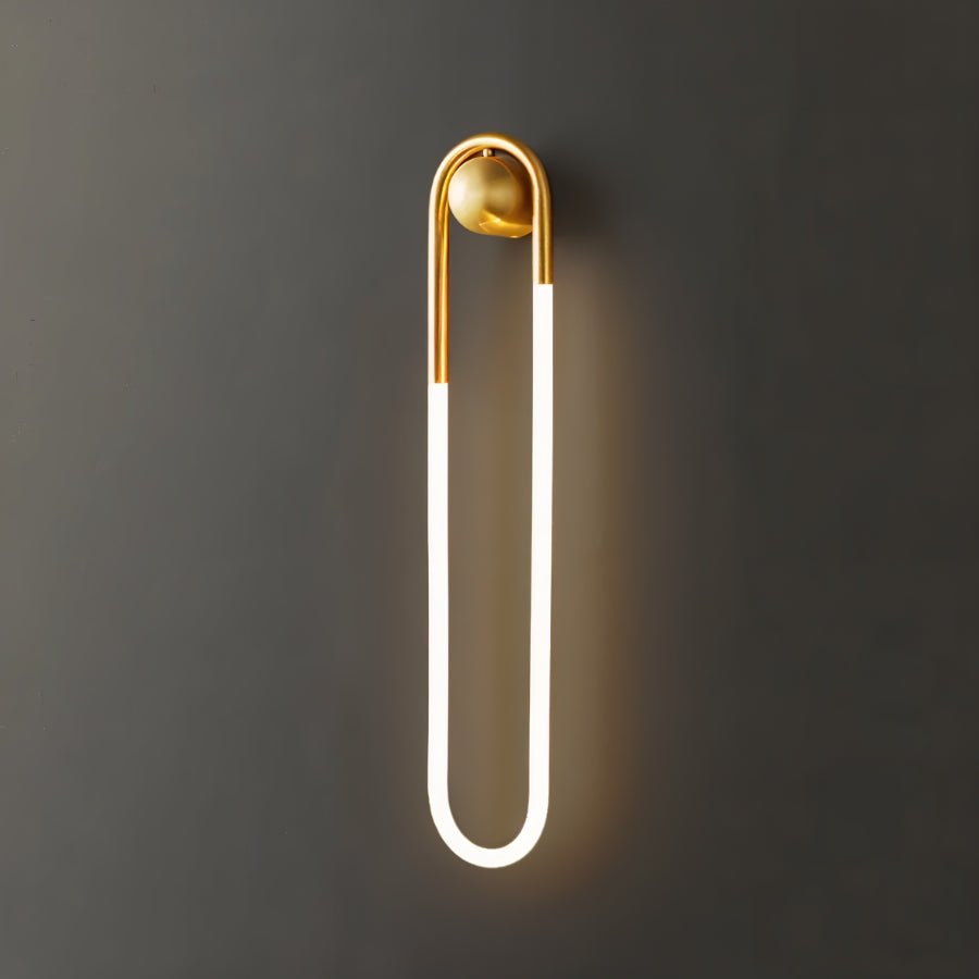 Modern brass Zenn Wall Lamp by Residence Supply featuring sleek, minimalist design and ambient lighting for contemporary interiors.