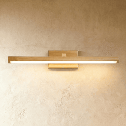 Zoleryn wall lamp by Residence Supply with a sleek black metal finish and modern minimalist design, mounted on a wall.