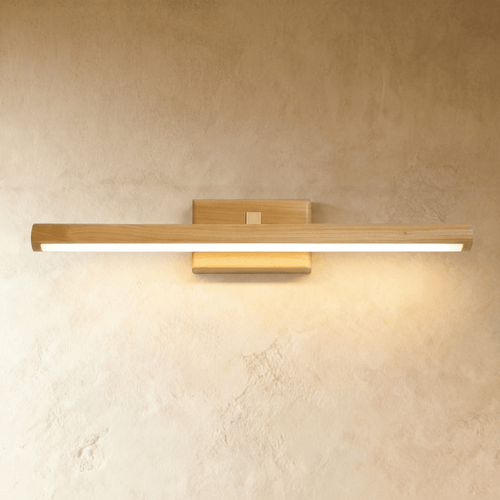 Zoleryn wall lamp by Residence Supply with a sleek black metal finish and modern minimalist design, mounted on a wall.